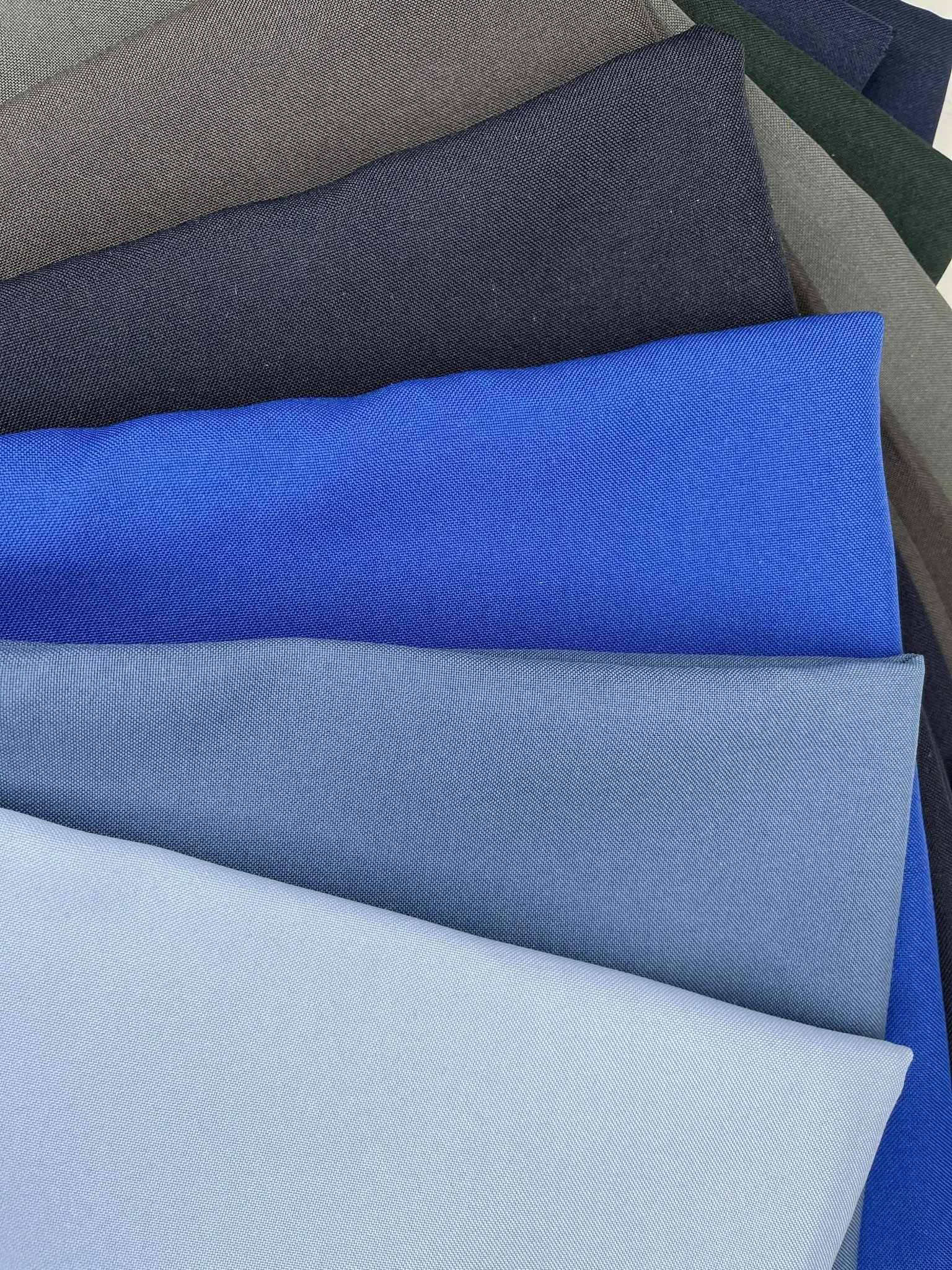 Mini Matt fabric, multifunctional polyester fabric for hospitality uniforms, aprons, tablecloths. Also known as Bi-Stretch Fabric.