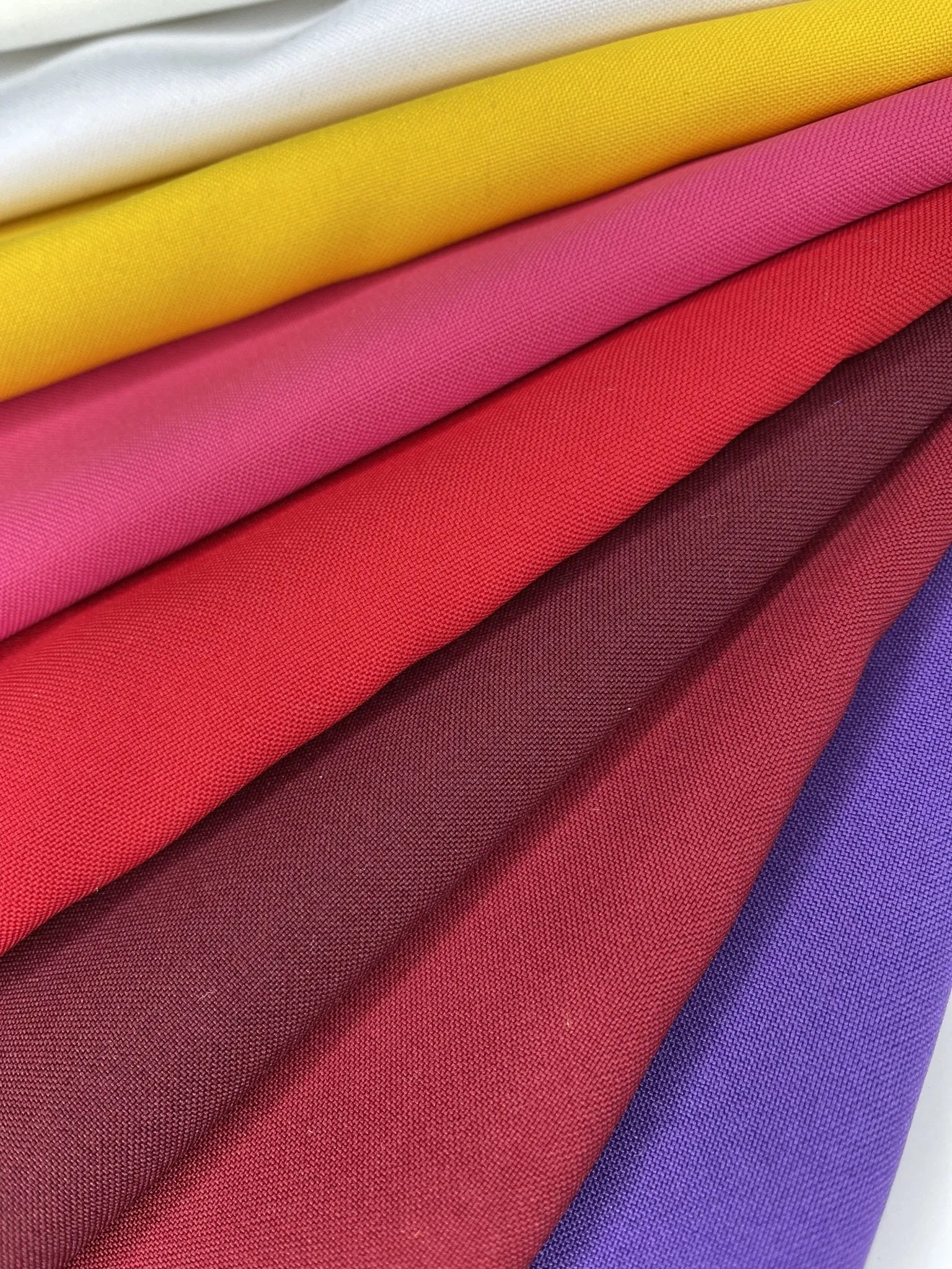 Mini Matt fabric, multifunctional polyester fabric for hospitality uniforms, aprons, tablecloths. Also known as Bi-Stretch Fabric.