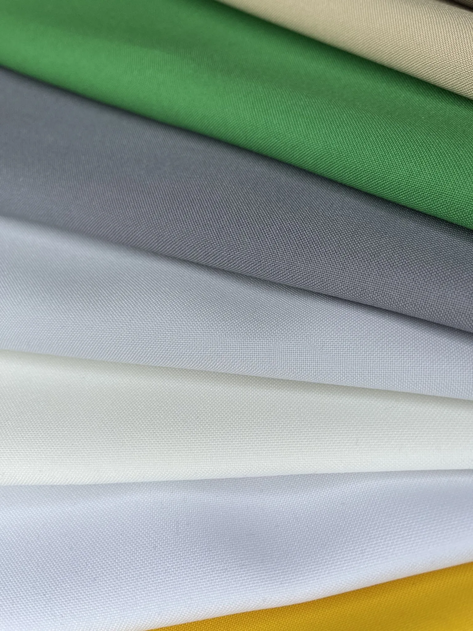 Mini Matt fabric, multifunctional polyester fabric for hospitality uniforms, aprons, tablecloths. Also known as Bi-Stretch Fabric.